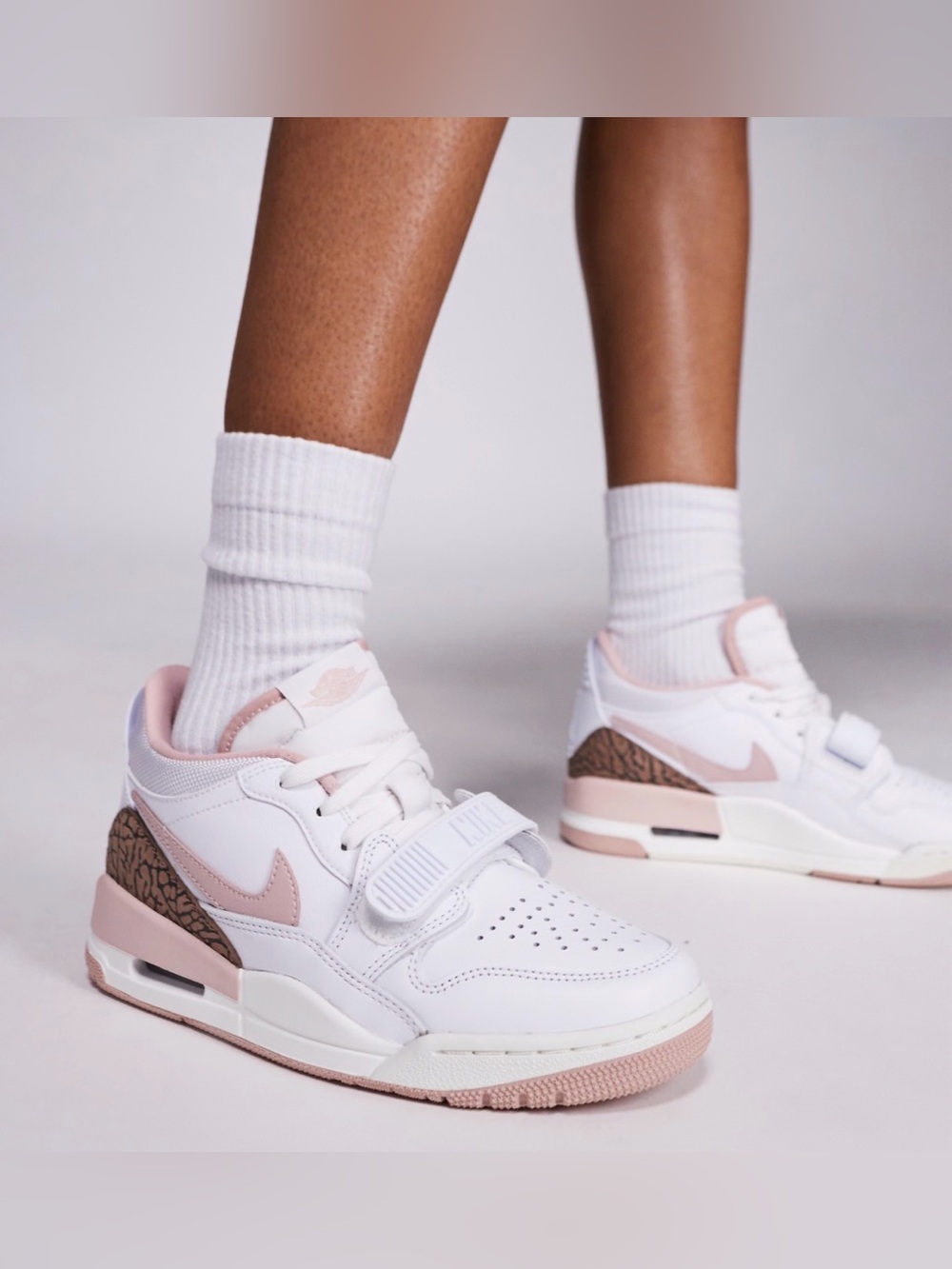 Nike Air Jordan Legacy 312 Low sneakers in white and pink. Size 8. MSRP $145